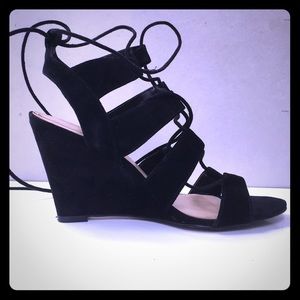 Black suede gladiator sandals from Aldo, size 9.